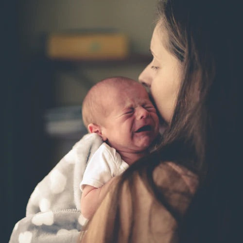 Is it normal for my newborn to cry this much? How can I soothe them?