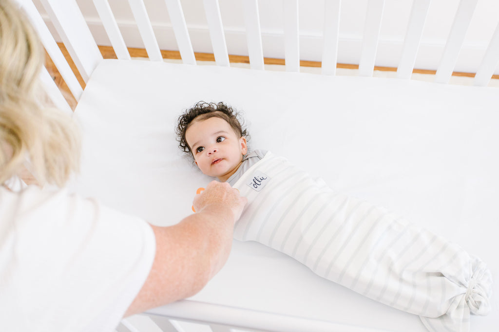 How do you know if your baby is ready to transition from a 3 to a 2 nap schedule?